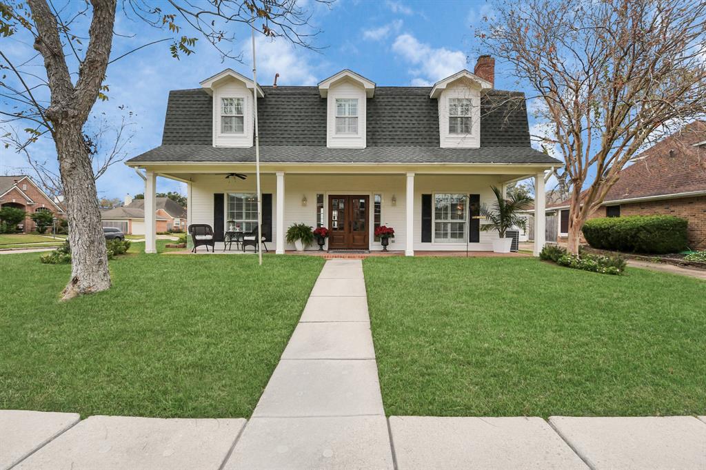 Southern charm at its finest! This custom two-story home welcomes you with an elegant front porch adorned with stately columns, setting the stage for timeless beauty and inviting you to discover more inside.