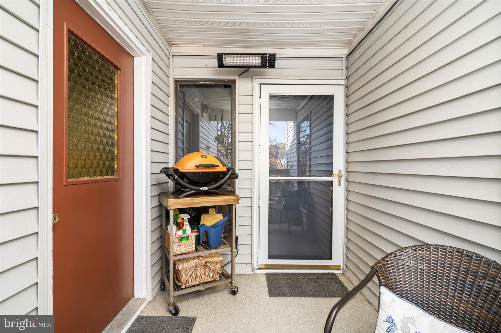 a view of a porch with furniture