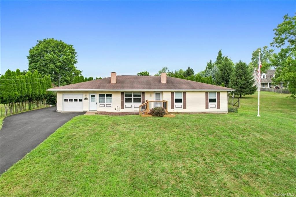 a view of a house with a big yard