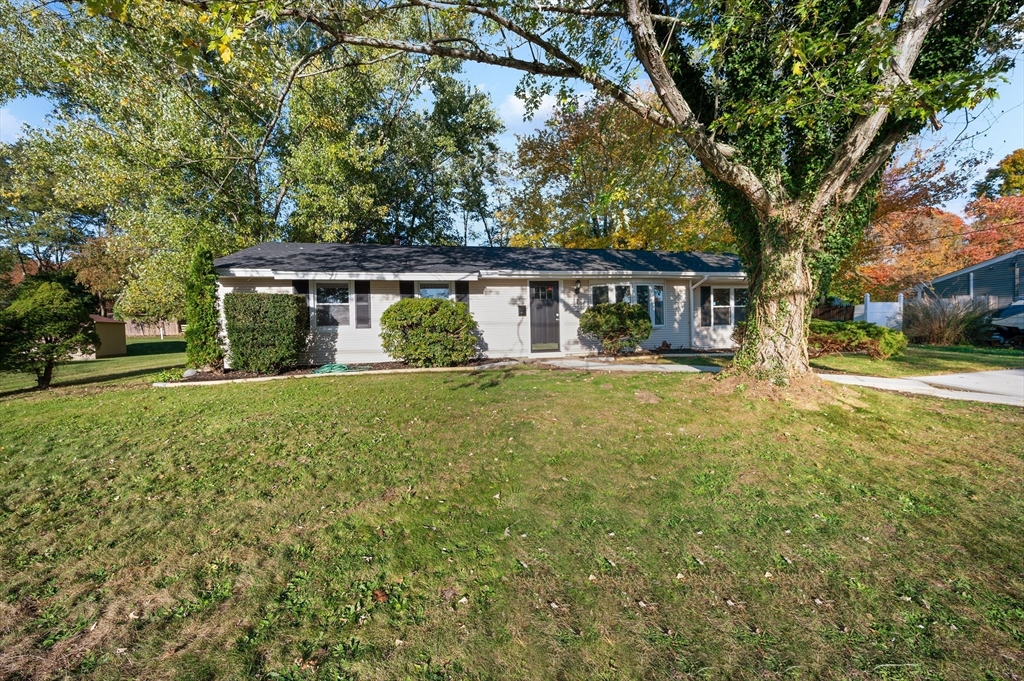 front view of a house with a yard