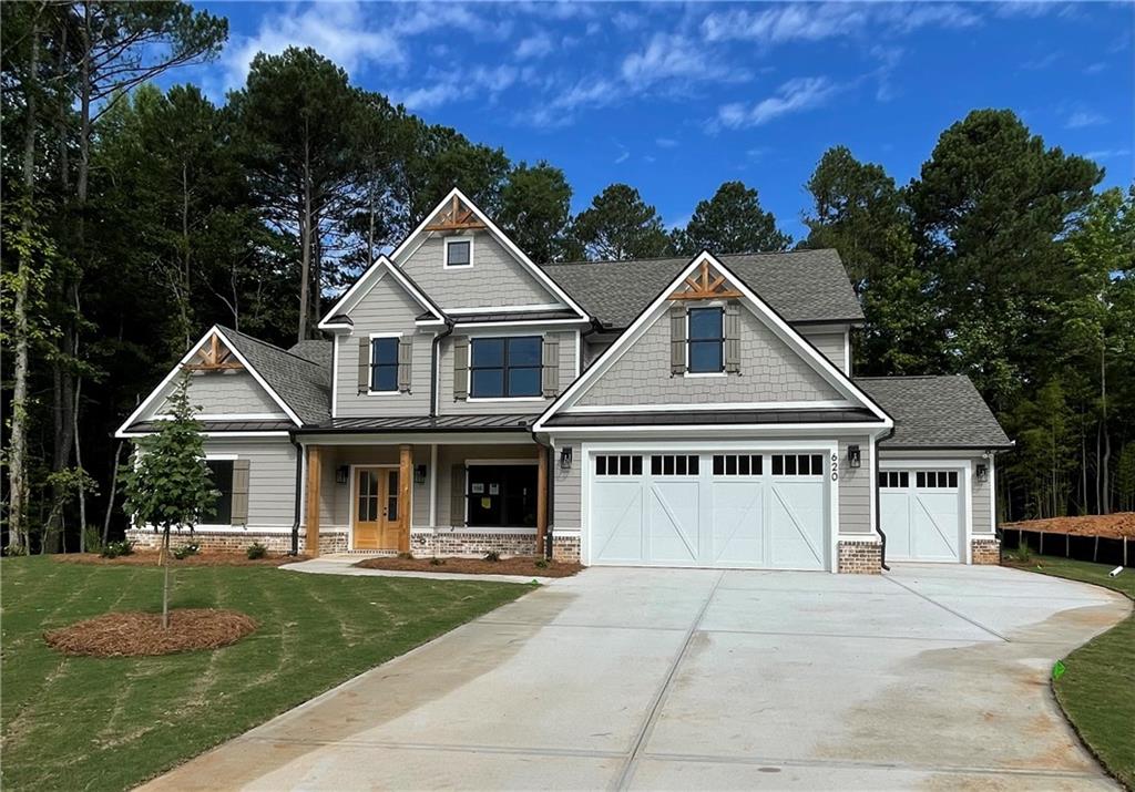 front view of a house with a yard