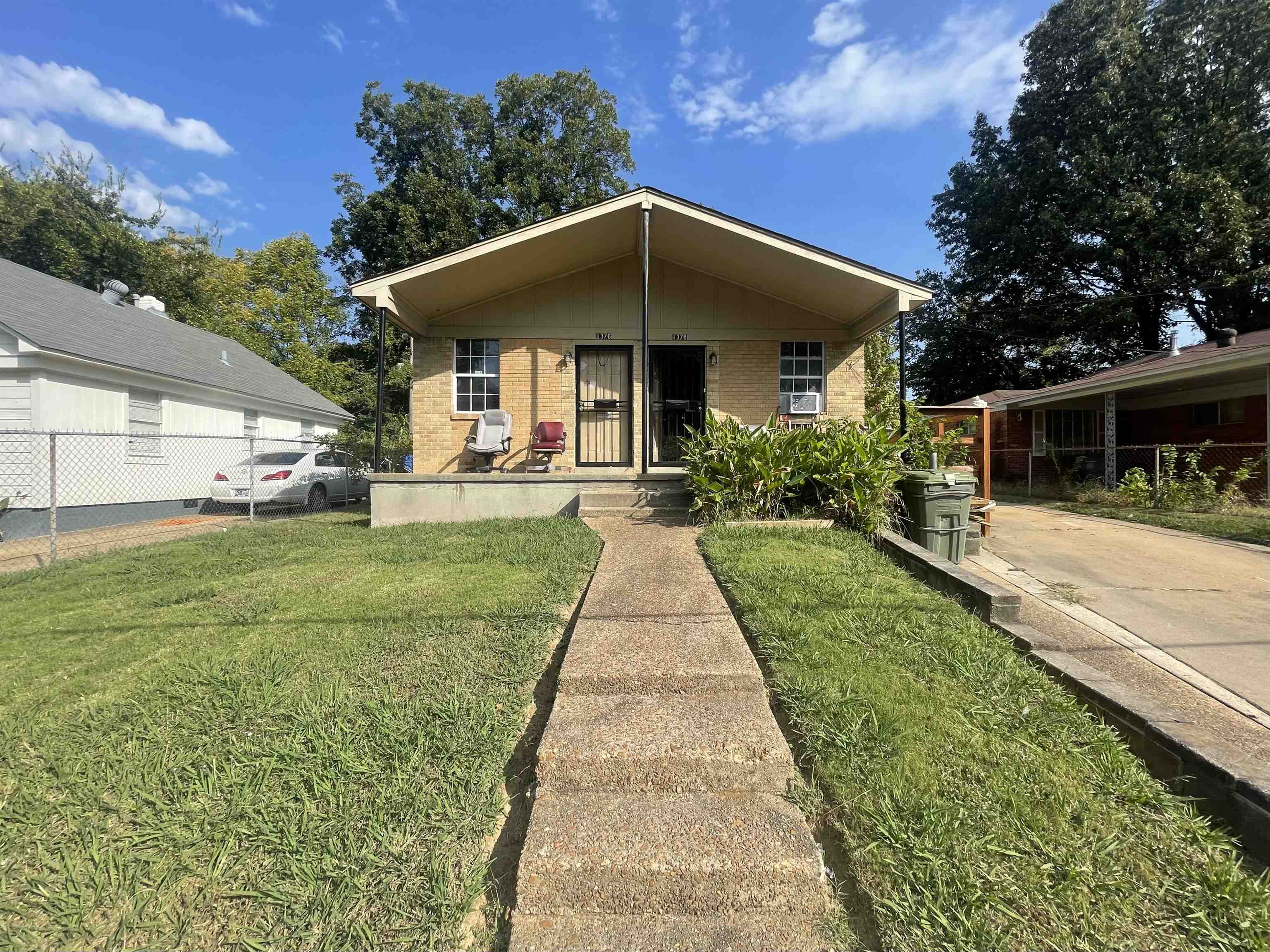 a front view of house with yard