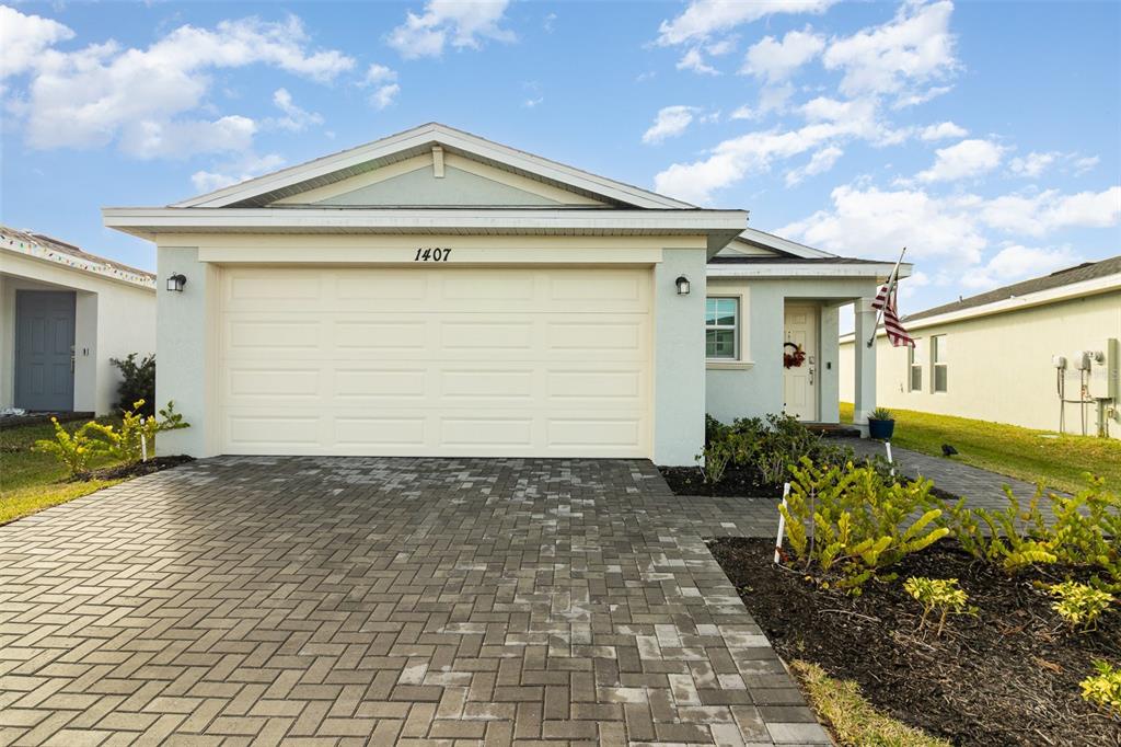 a front view of house with yard