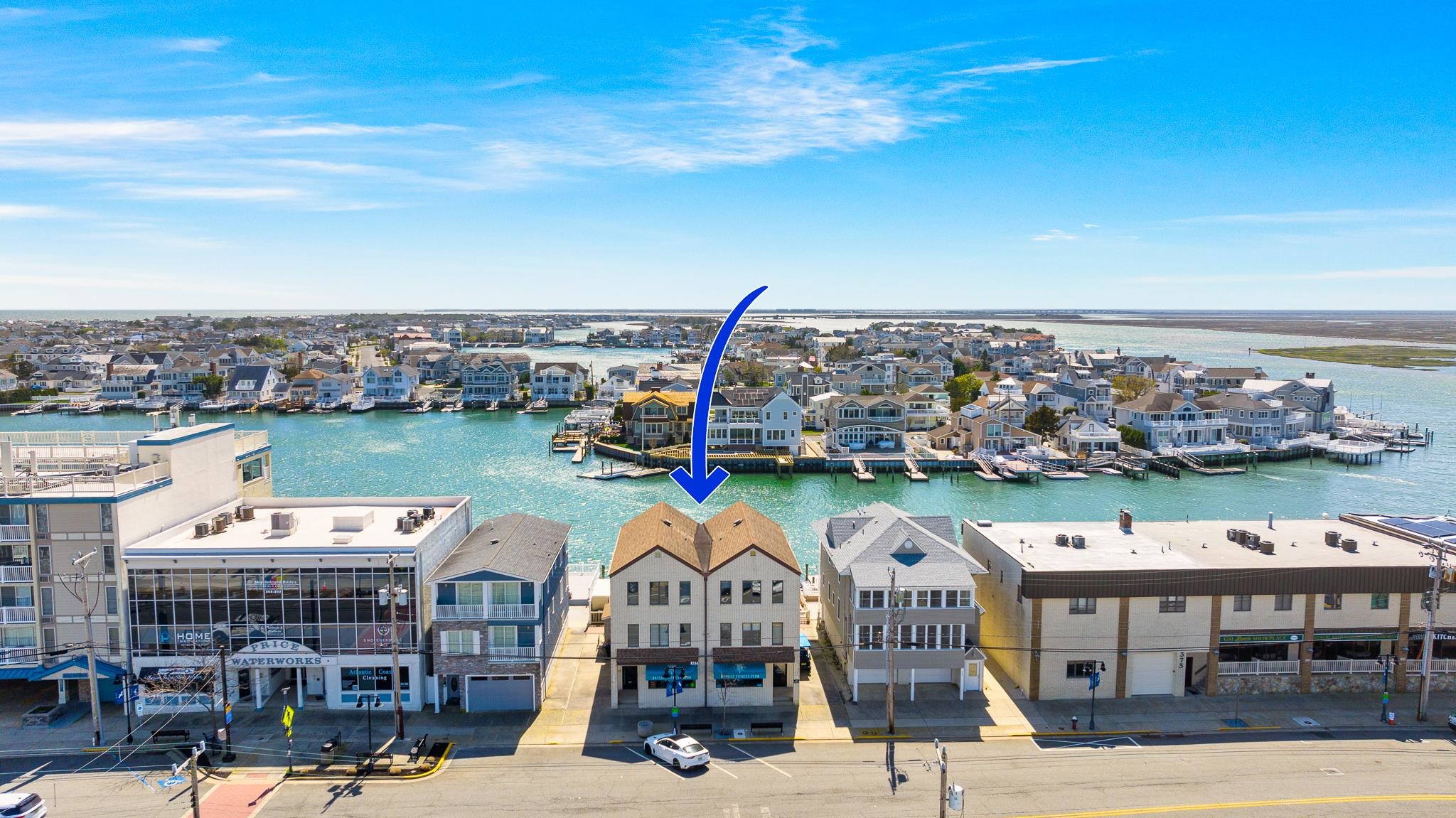 a view of a city with an ocean view