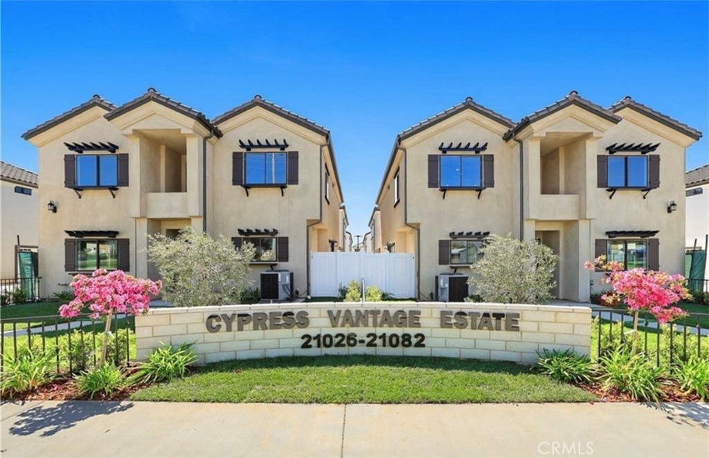 a front view of multi story residential houses