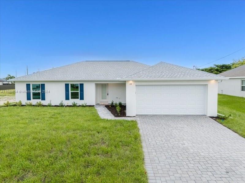 front view of a house and a yard