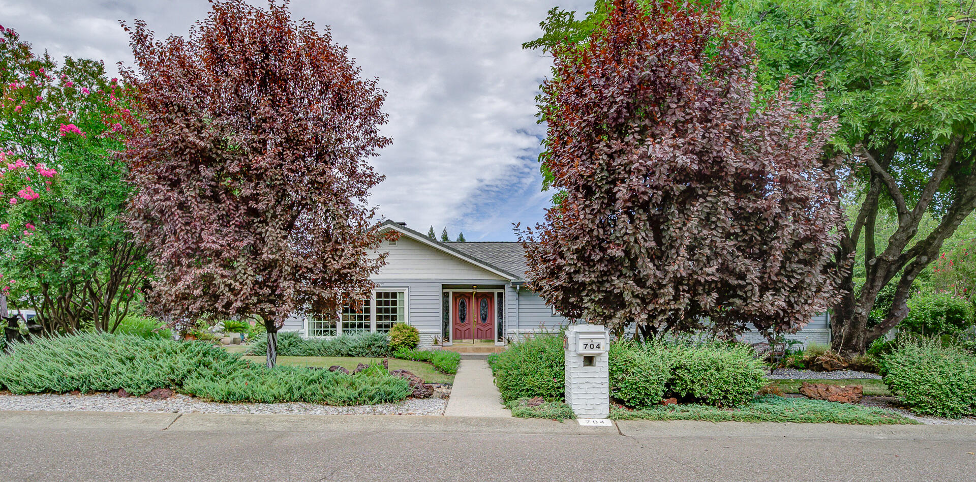 a view of a house with garden