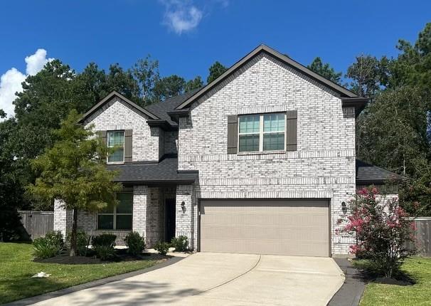 a front view of a house with yard