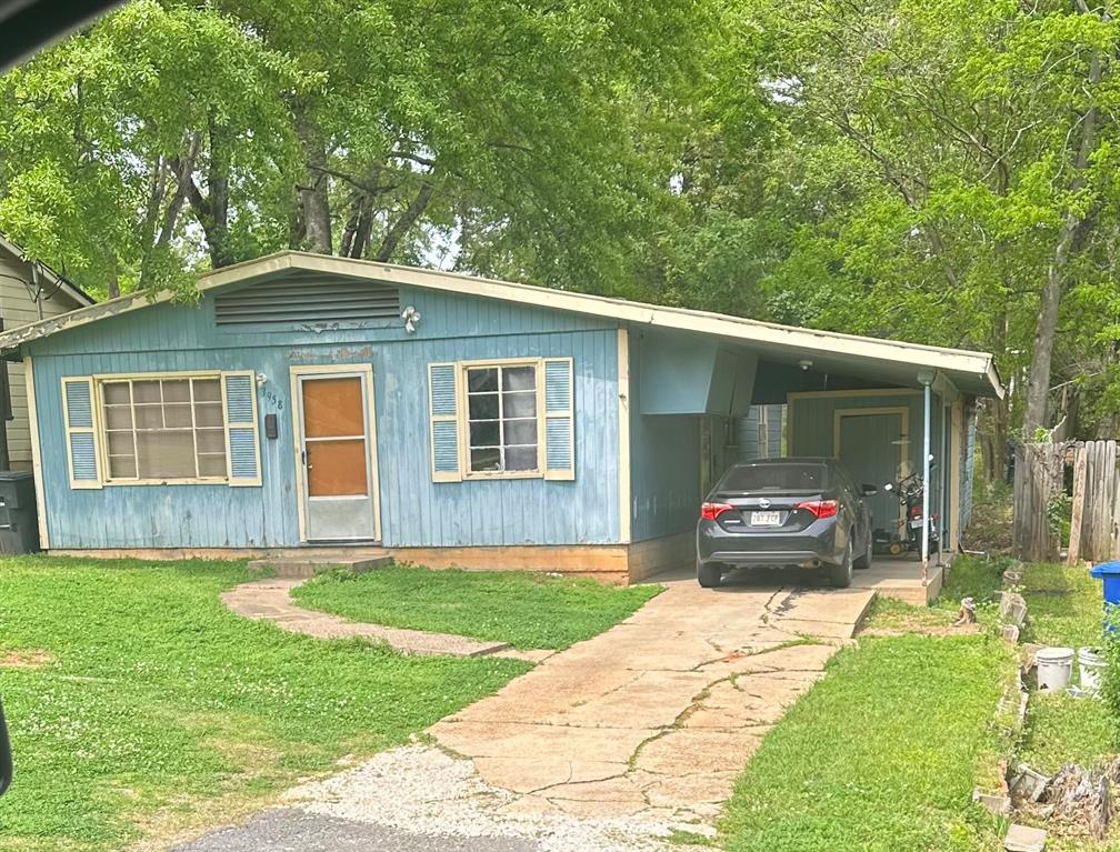 a house view with a garden space