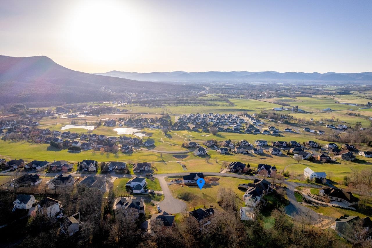 an aerial view of residential house and lake view