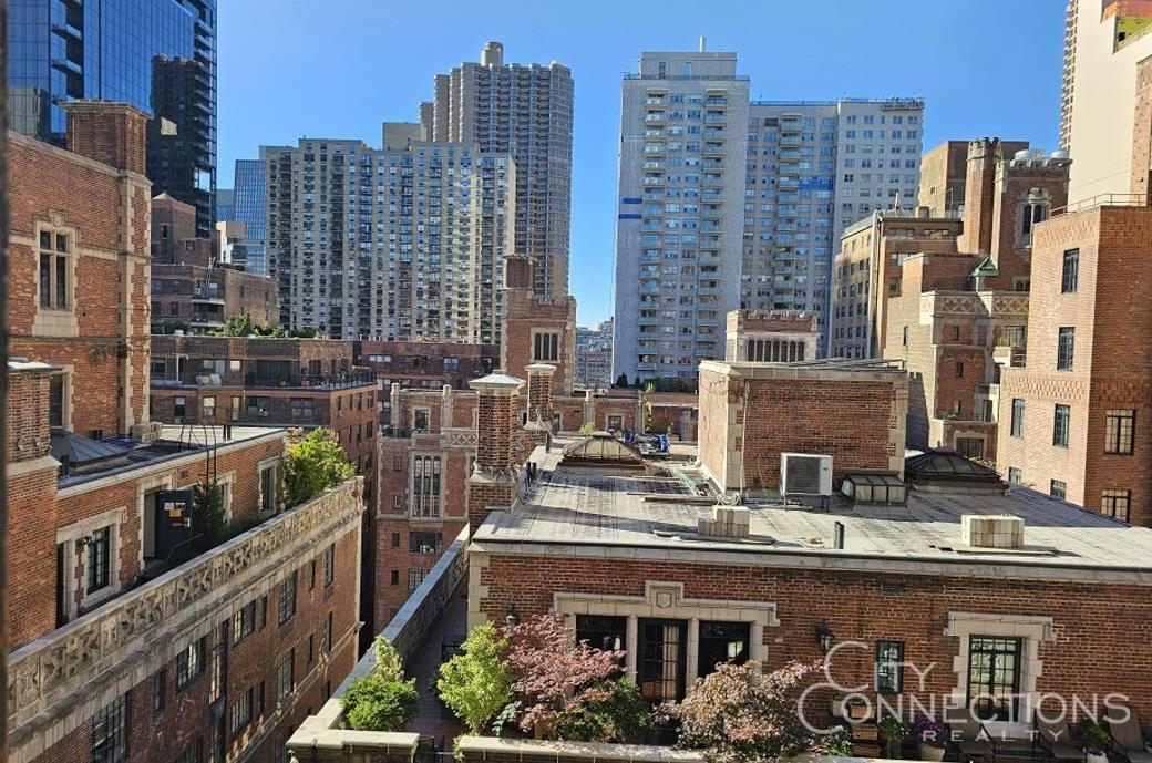 a city view with tall buildings