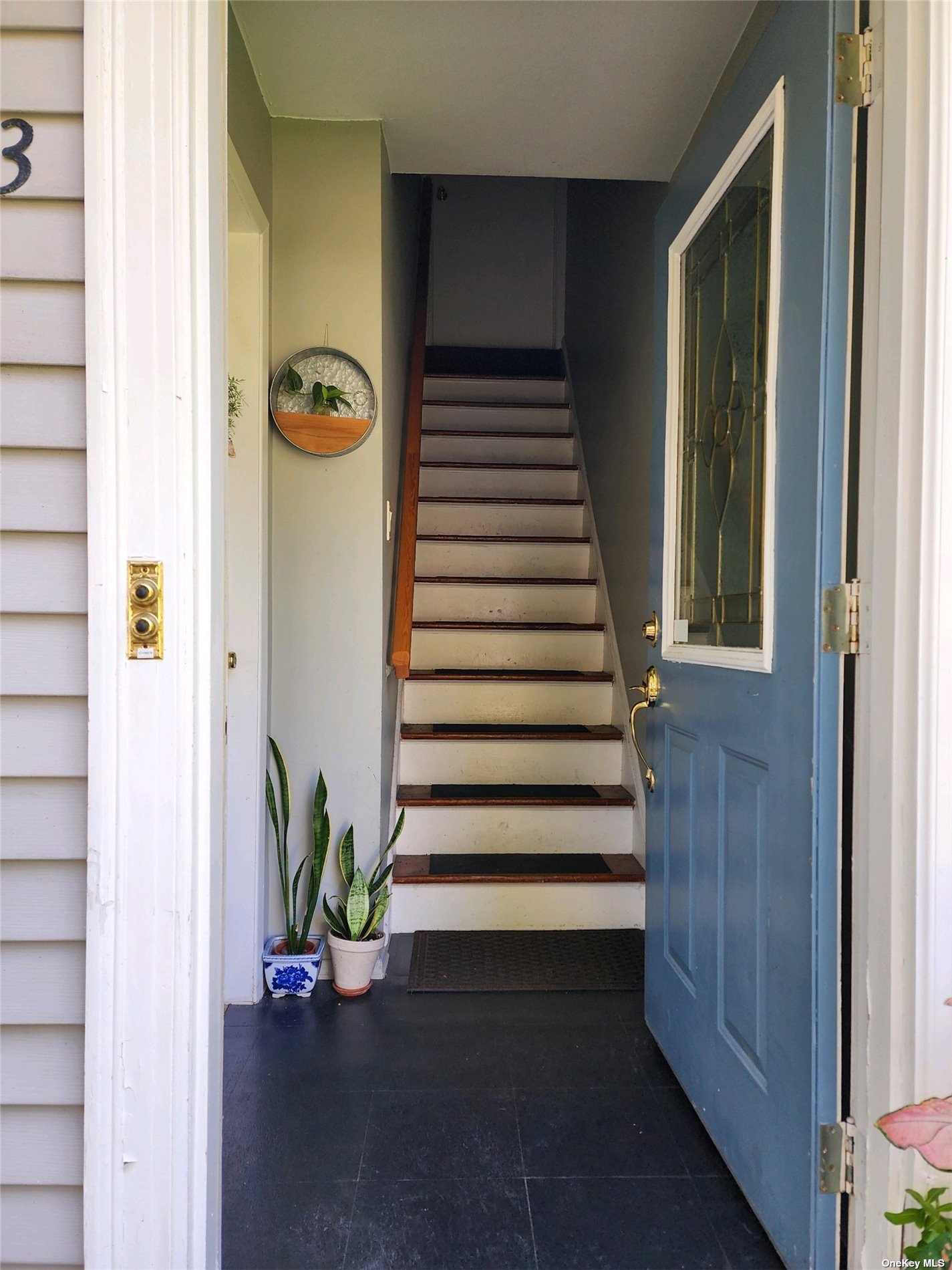 a view of entryway with wooden door