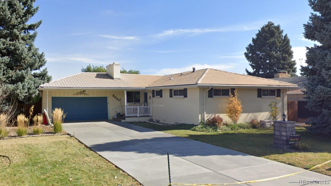 a front view of a house with yard