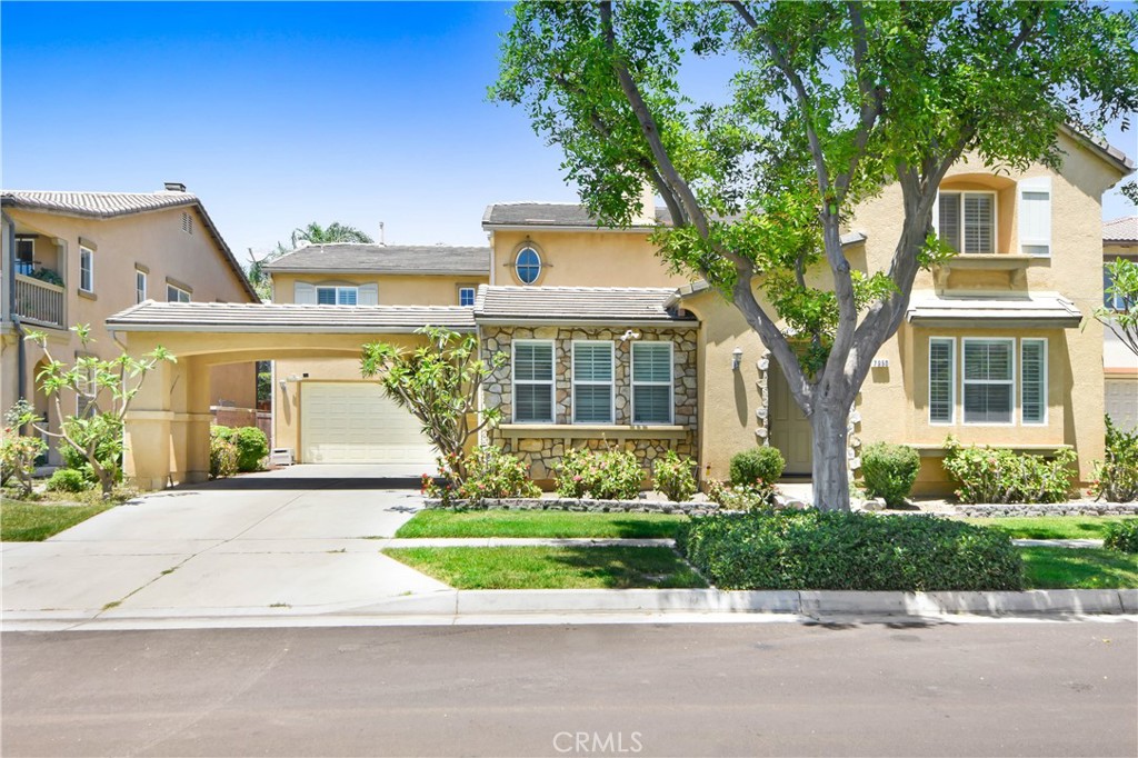 front view of a house with a yard