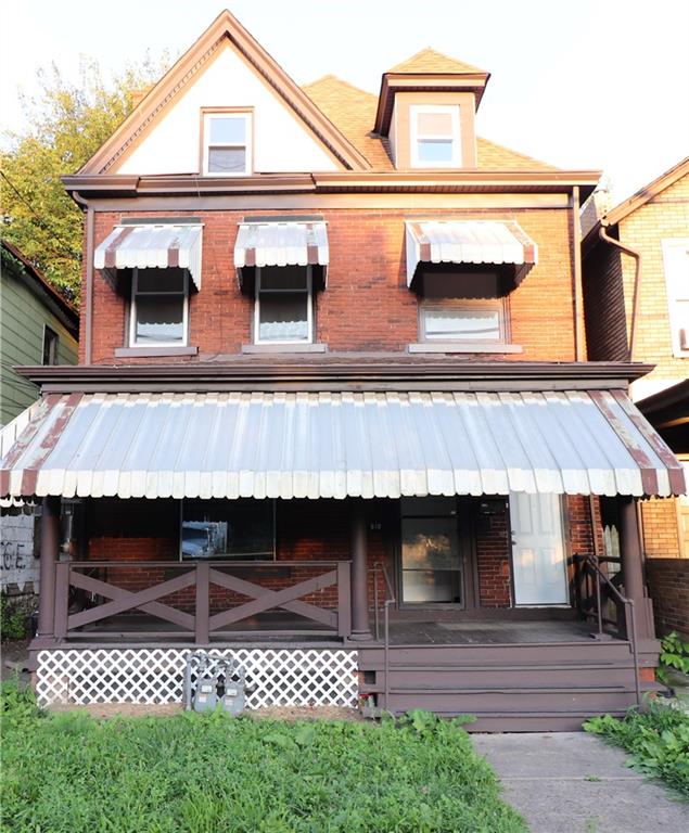 a view of a house with a balcony