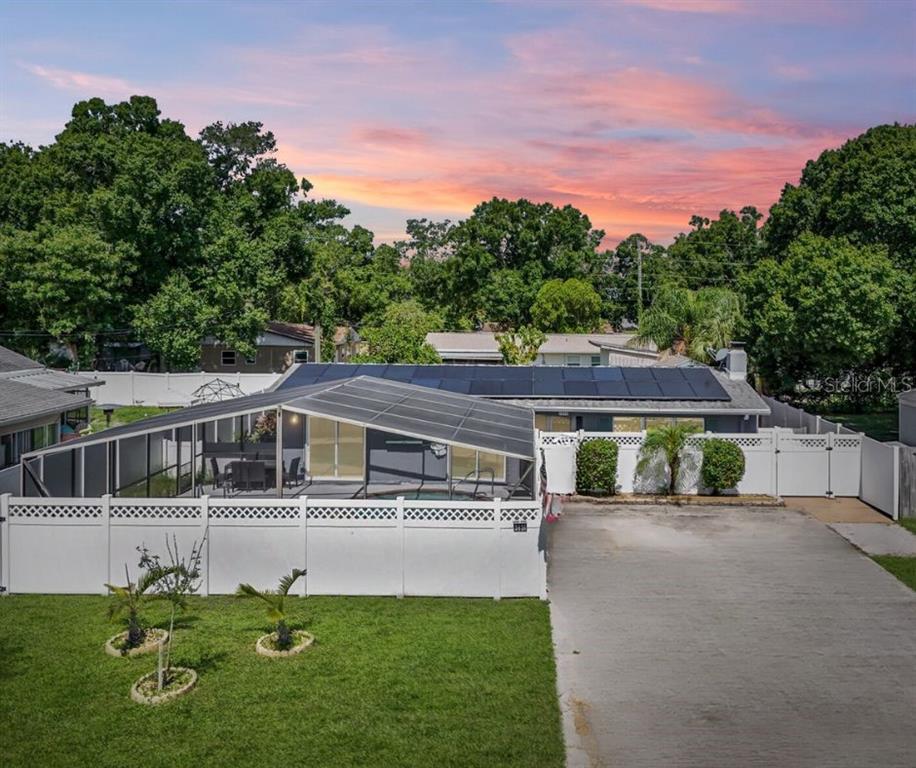 a view of a house with a big yard