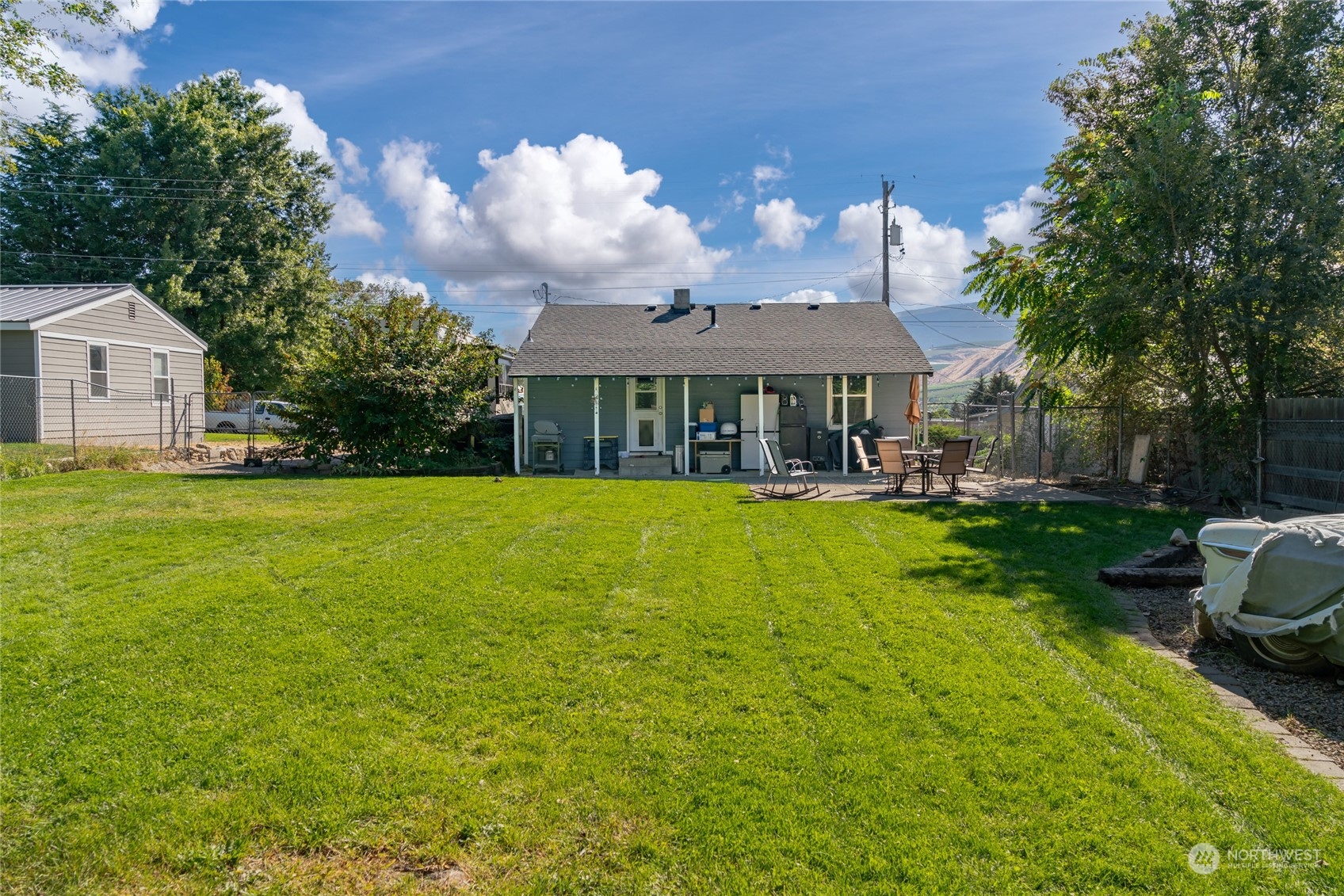 a view of a house with a big yard