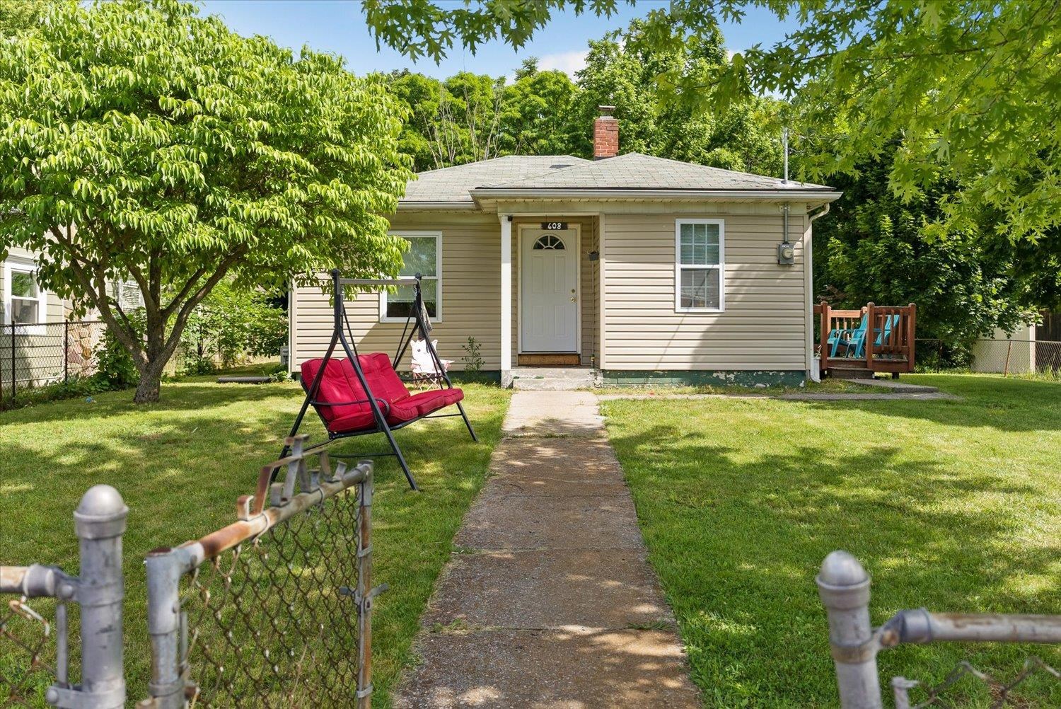 a front view of house with yard