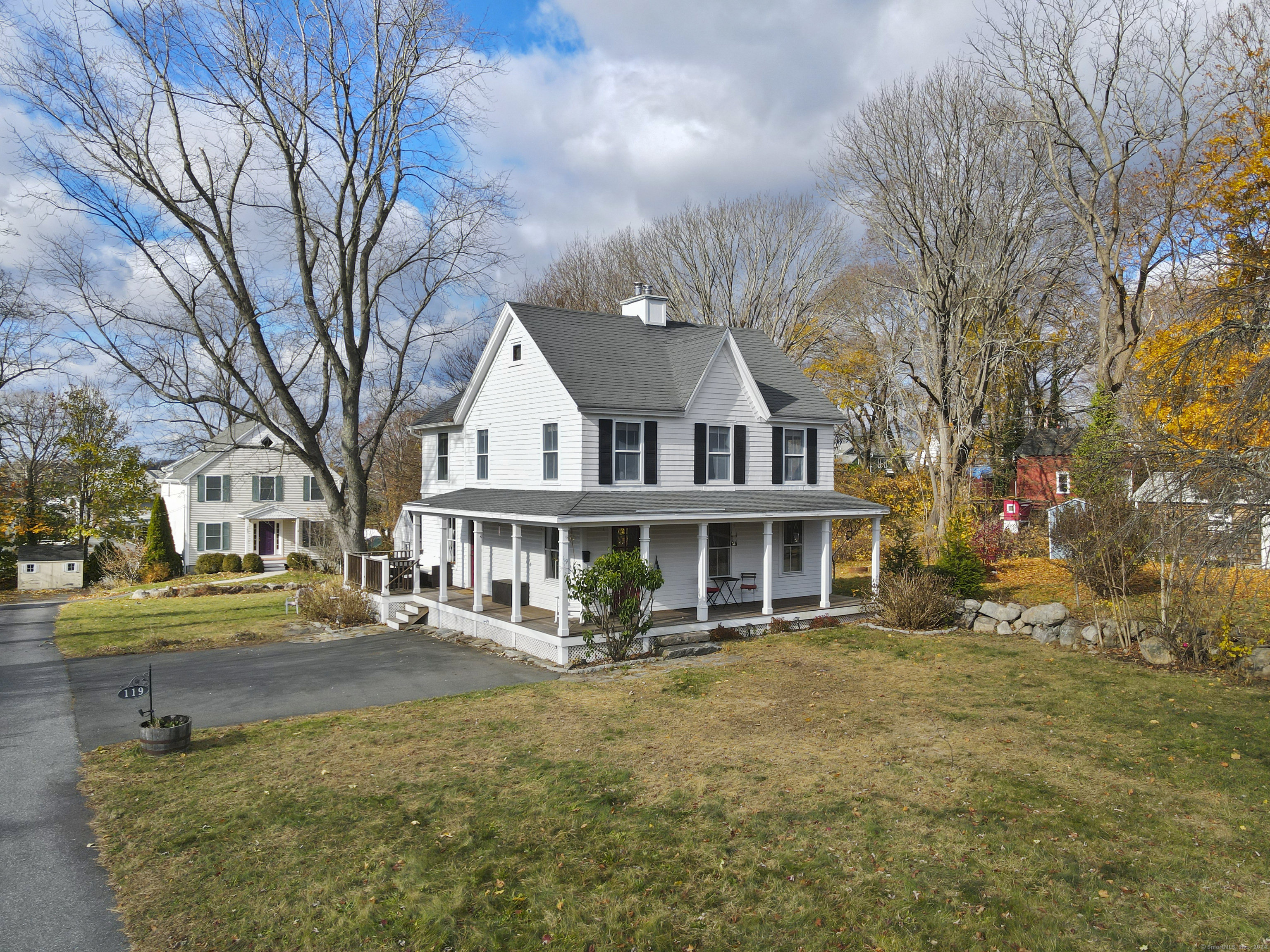 a front view of a building with a yard