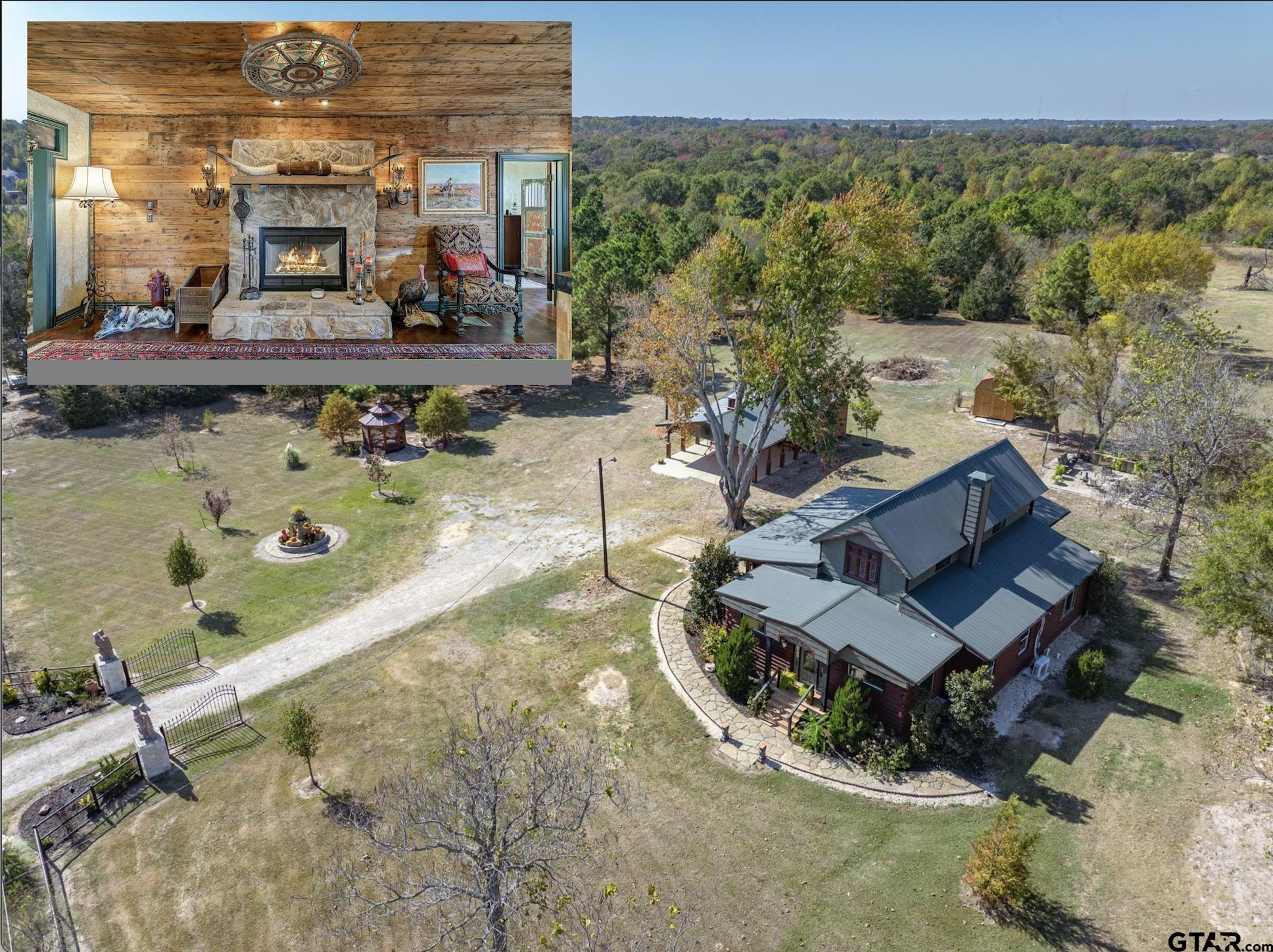 an aerial view of a house with swimming pool