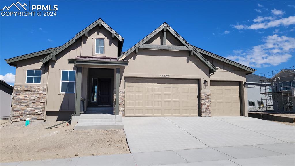 Falkirk-Colorado Elevation-3 Car Garage-Finished Basement with 9' Ceilings-Energy Rated-Desirable Highline at Wolf Ranch Community!