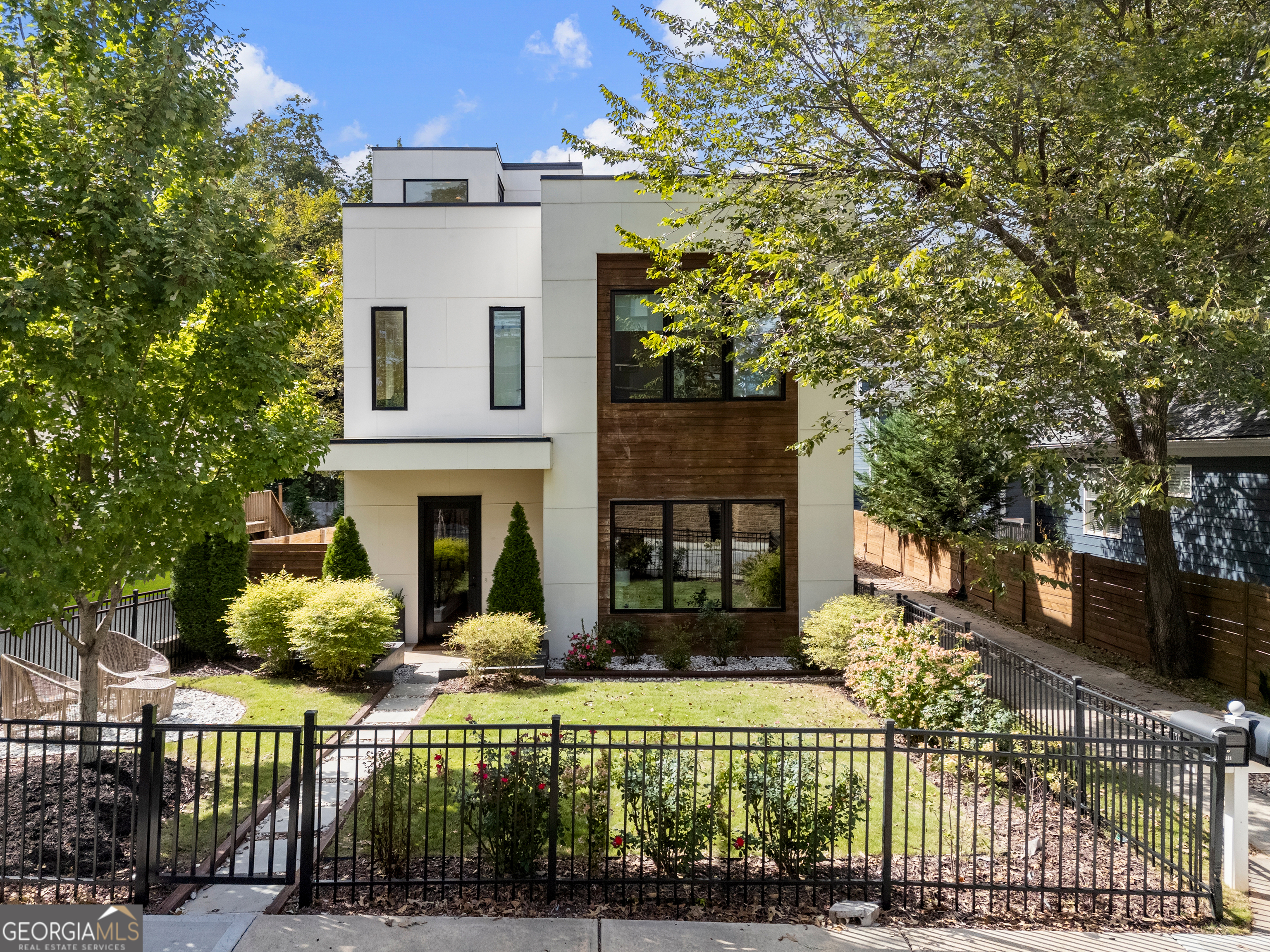 front view of a house with a yard