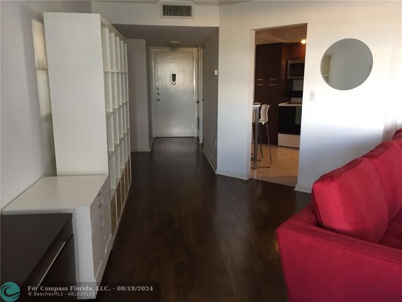 a view of livingroom with furniture and wooden floor