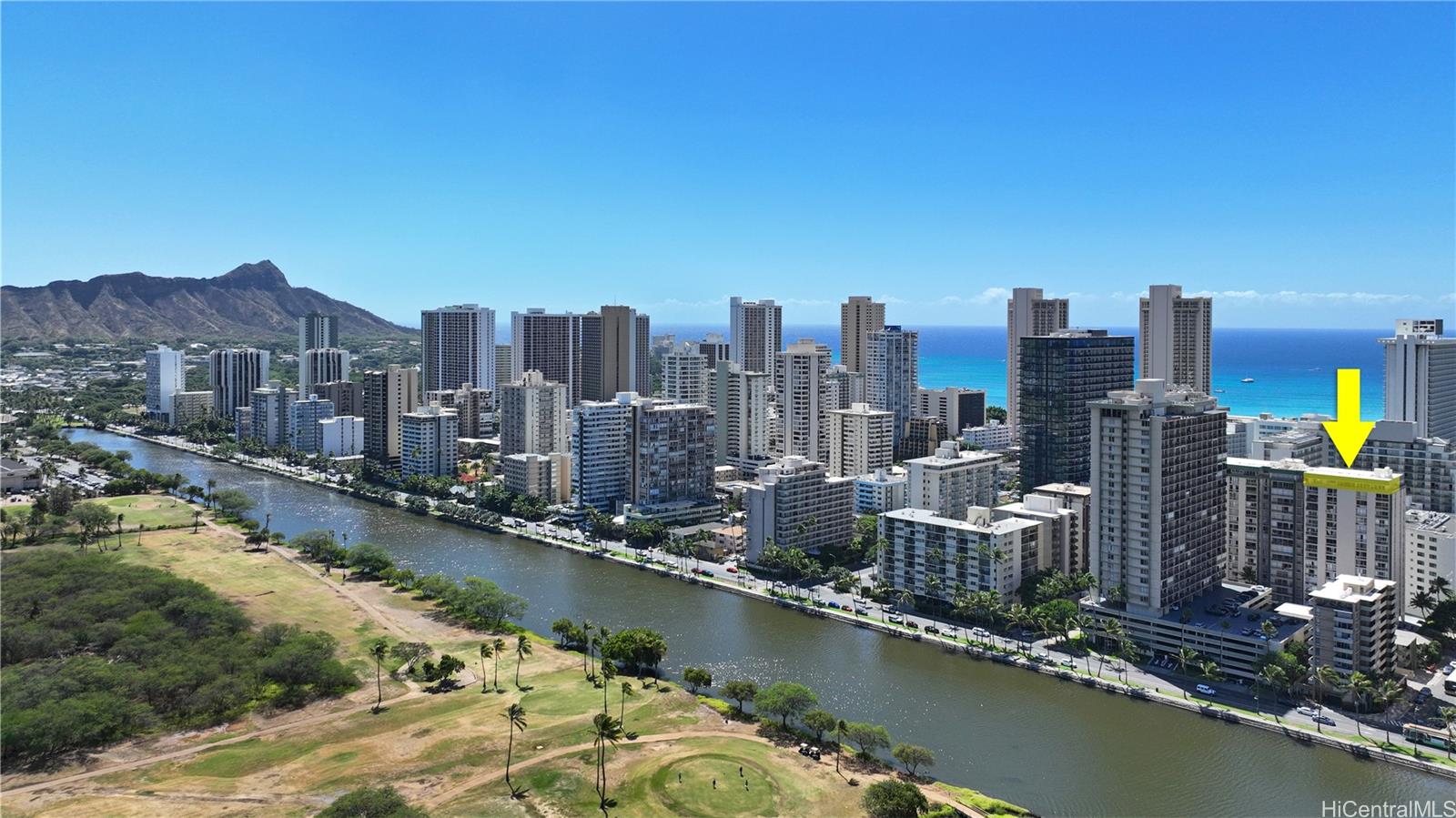 a view of a city with a lake