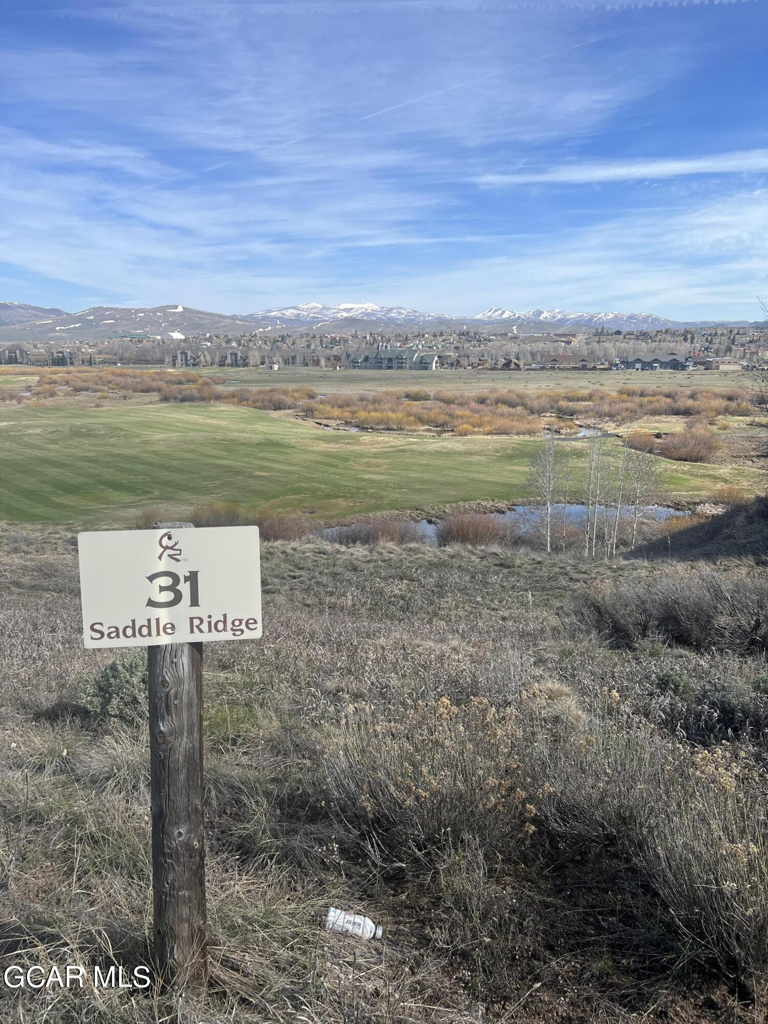 a view of a lake with a big yard