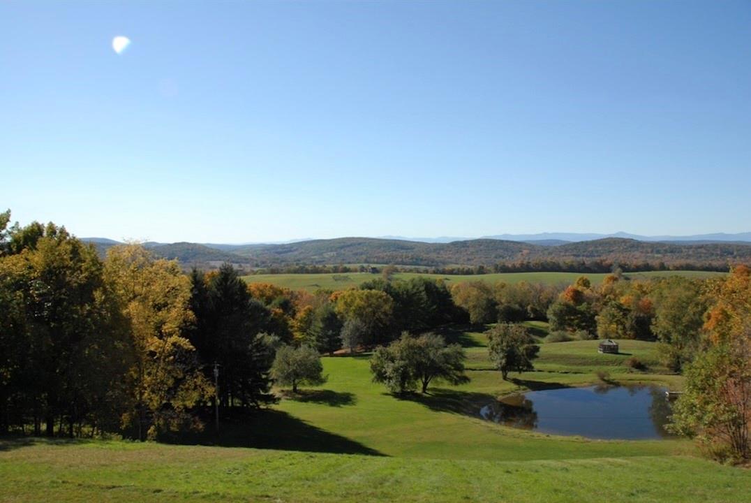 View of mountains feature featuring a water view