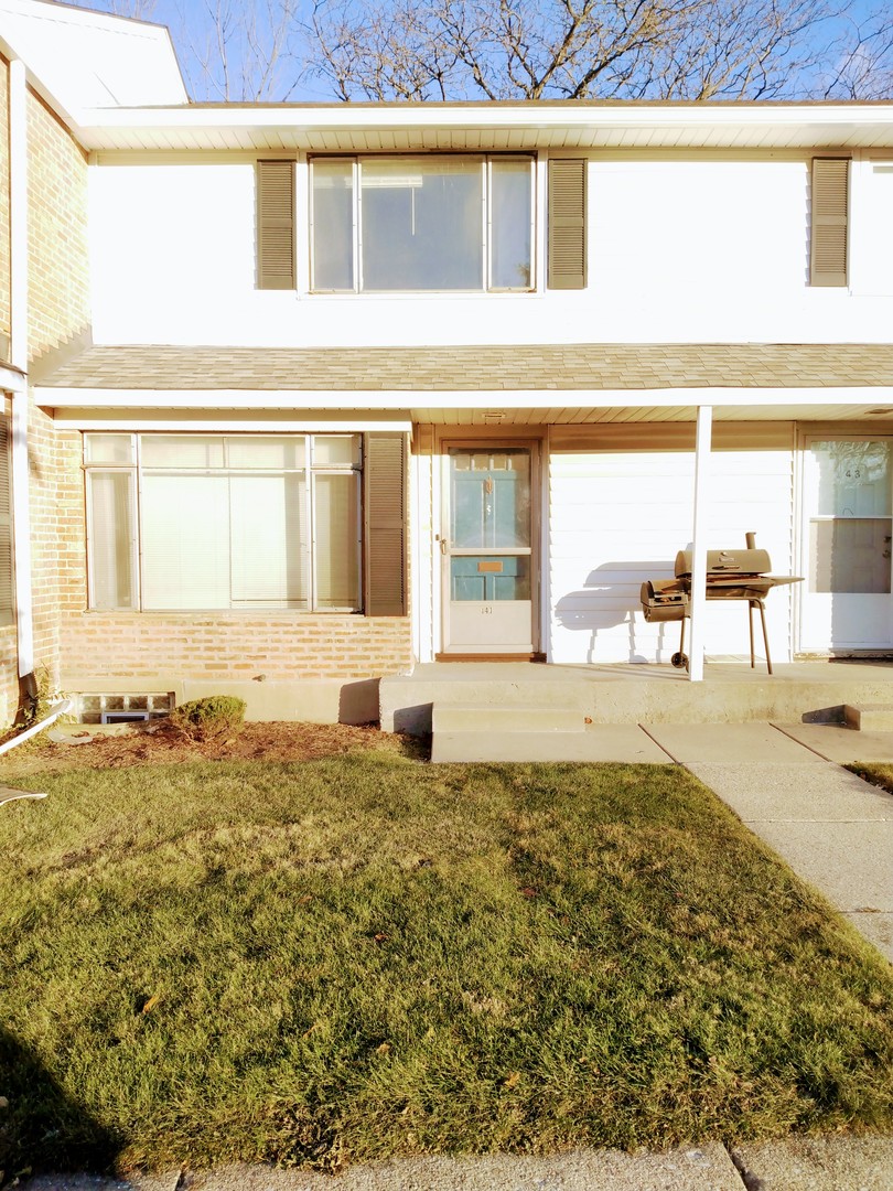 a view of a living room and entry way