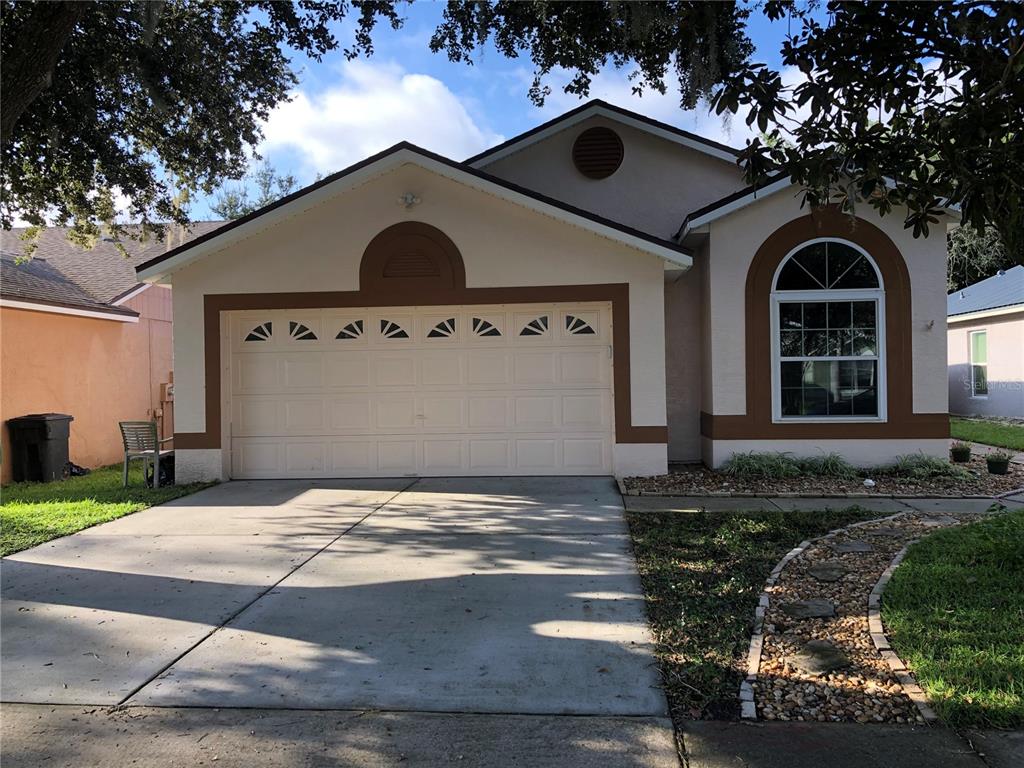 a front view of a house with yard