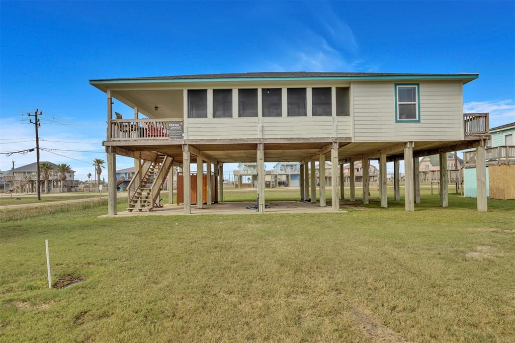 a front view of house with an outdoor space and seating