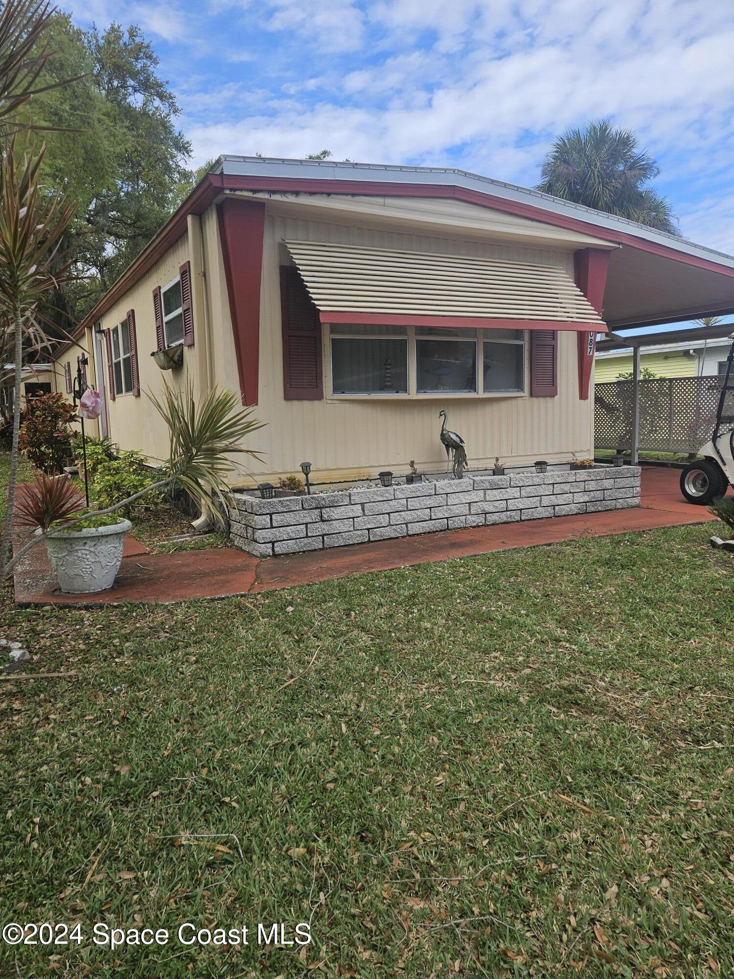 a front view of house with yard