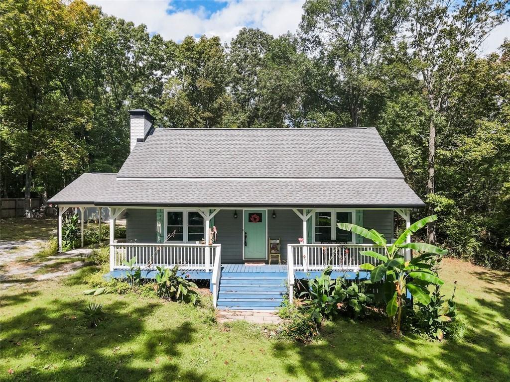 front view of a house with a yard