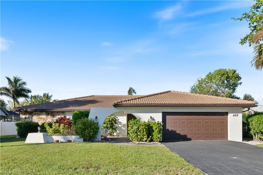 front view of house with a yard