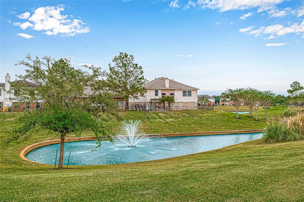 a view of a house with a swimming pool