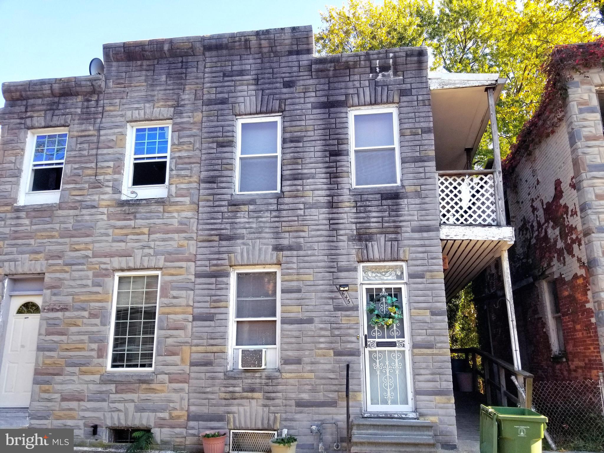 a brick building with a large windows