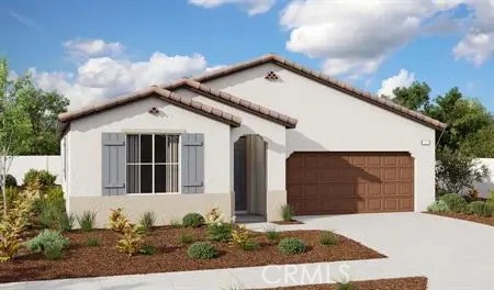 a front view of a house with garage