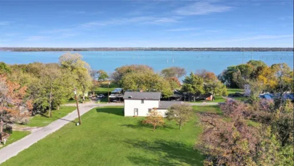 a view of a lake with a city