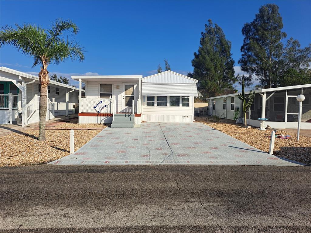 a view of a house with a patio