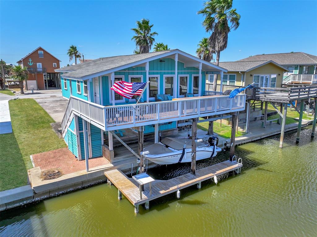 an aerial view of a house with swimming pool