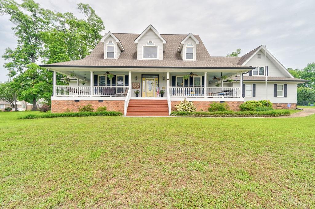 front view of a house with a yard