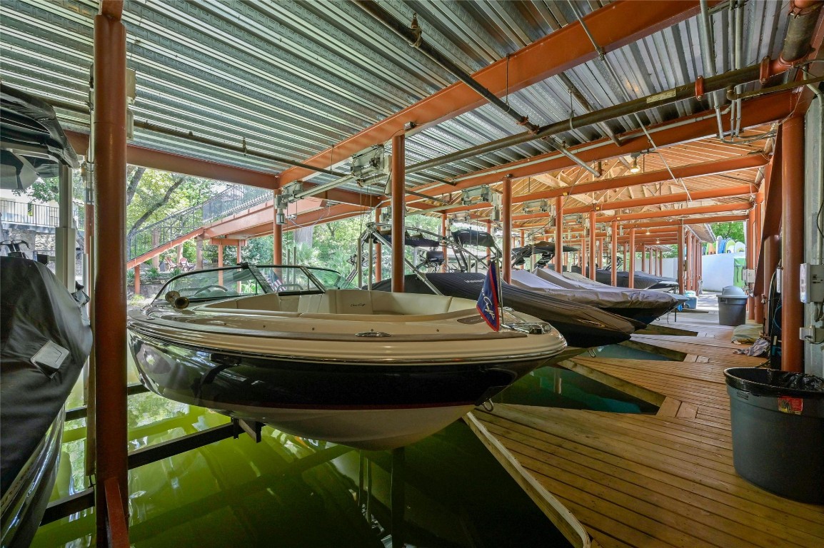 a view of swimming pool with outdoor seating