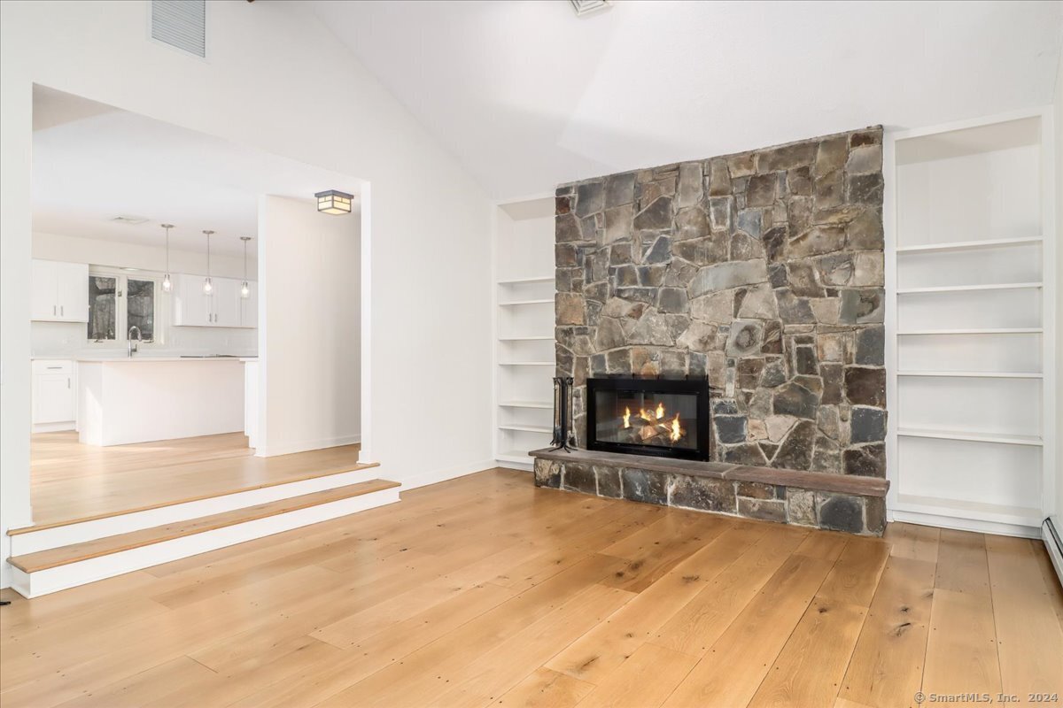 a view of a livingroom with a fireplace