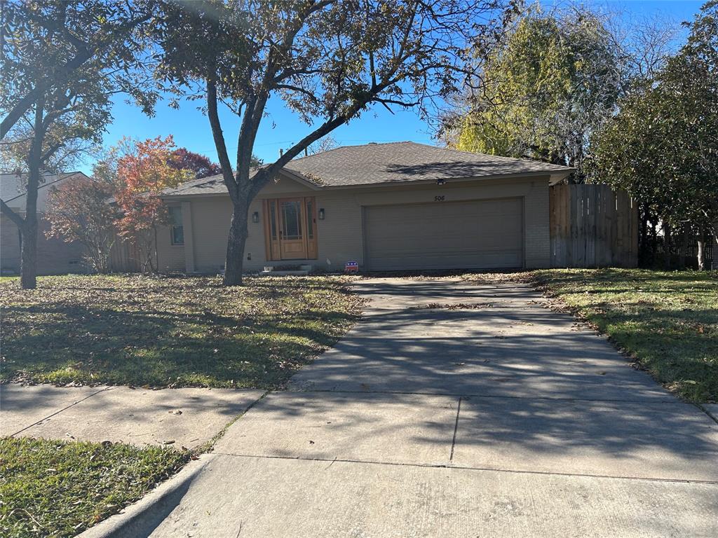 a house with yard in front of it