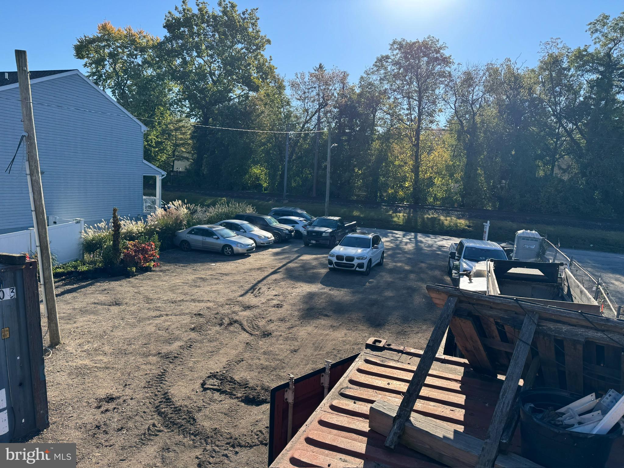 a view of a backyard with sitting area