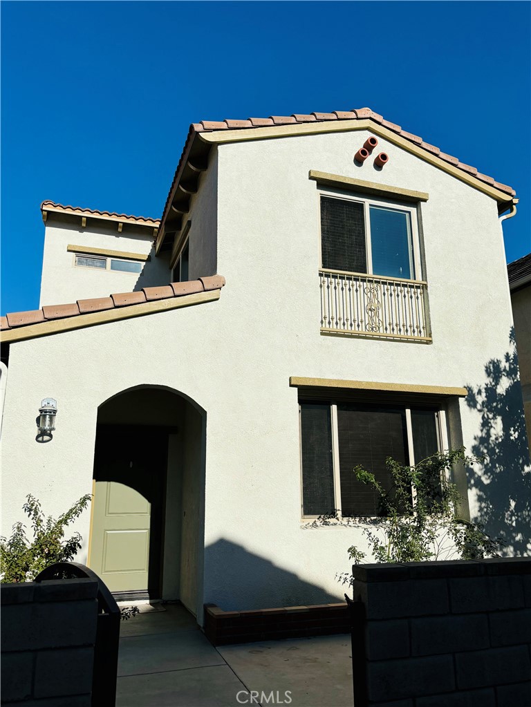 a front view of a house with yard