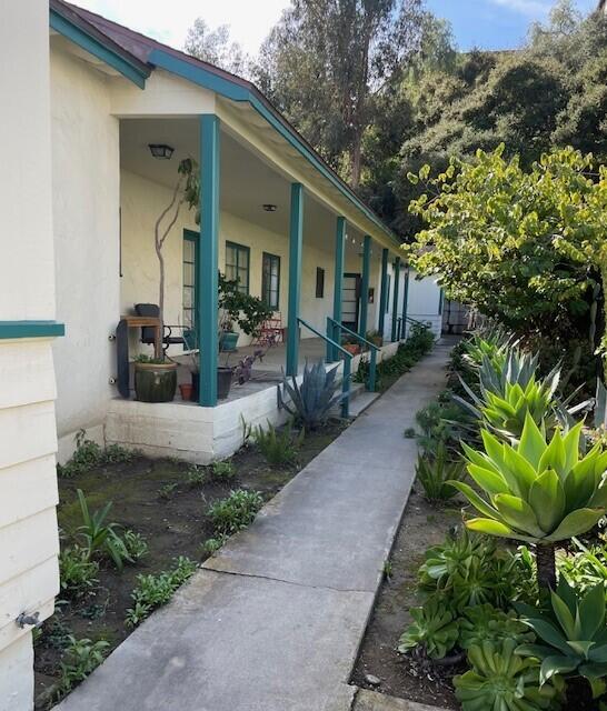 a front view of a house with a porch