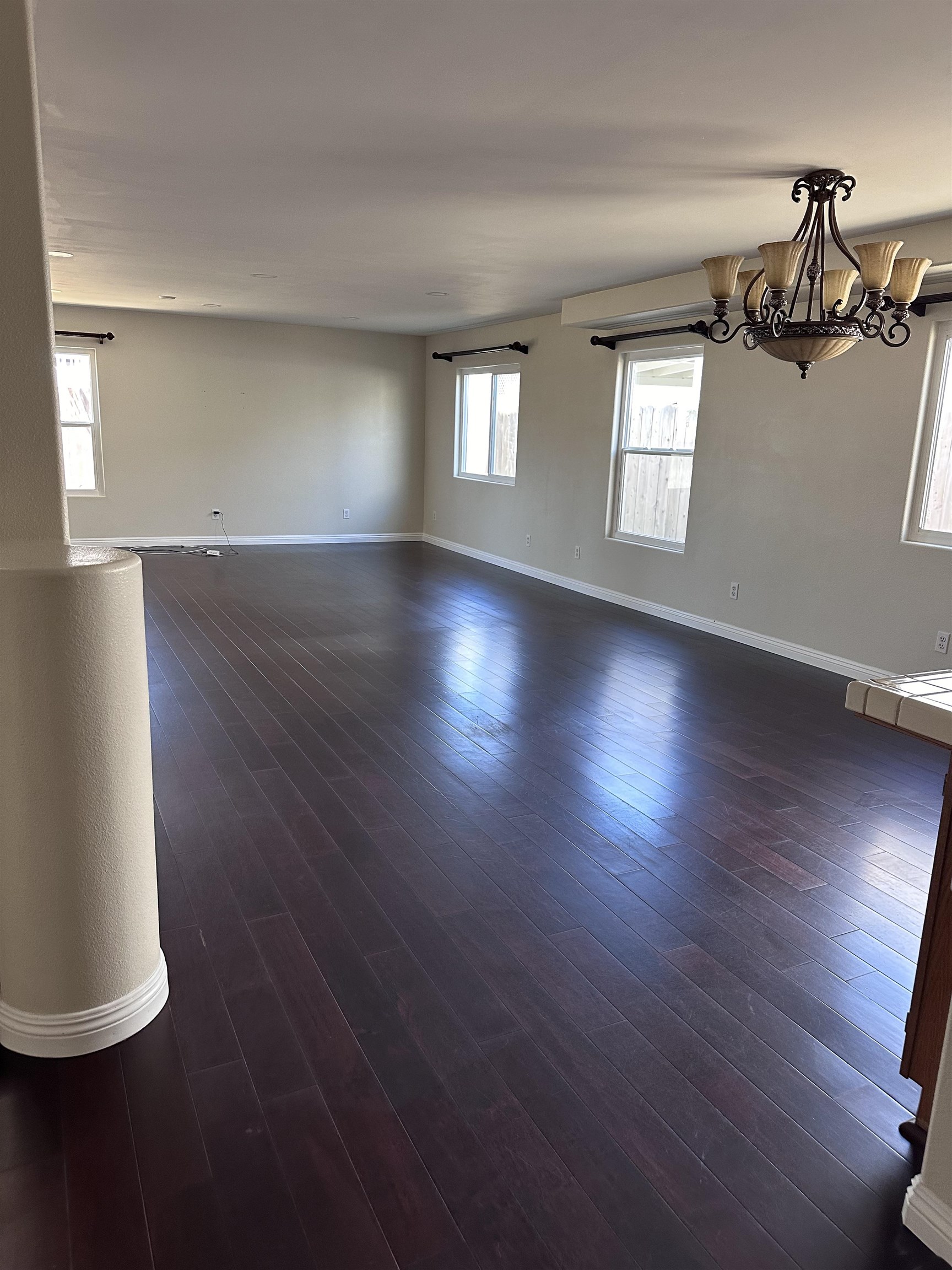 a view of livingroom and hardwood floor